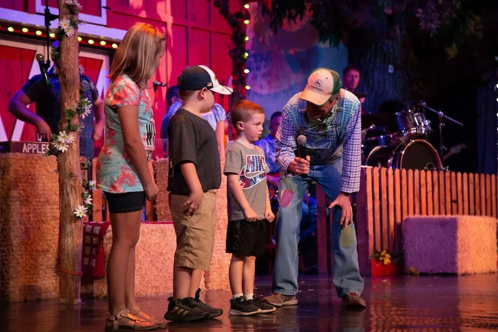 kids on stage at The Comedy Barn