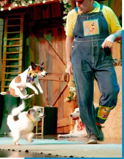 Comedy Barn performer with dogs